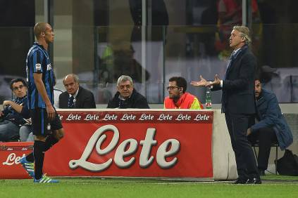 MILAN, ITALY - APRIL 03:  Joao Miranda (L) of FC Internazionale Milano walks off after receiving the red card from referee Marco Guida during the Serie A match between  FC Internazionale and Torino FC Milano at Stadio Giuseppe Meazza on April 3, 2016 in Milan, Italy.  (Photo by Valerio Pennicino/Getty Images)